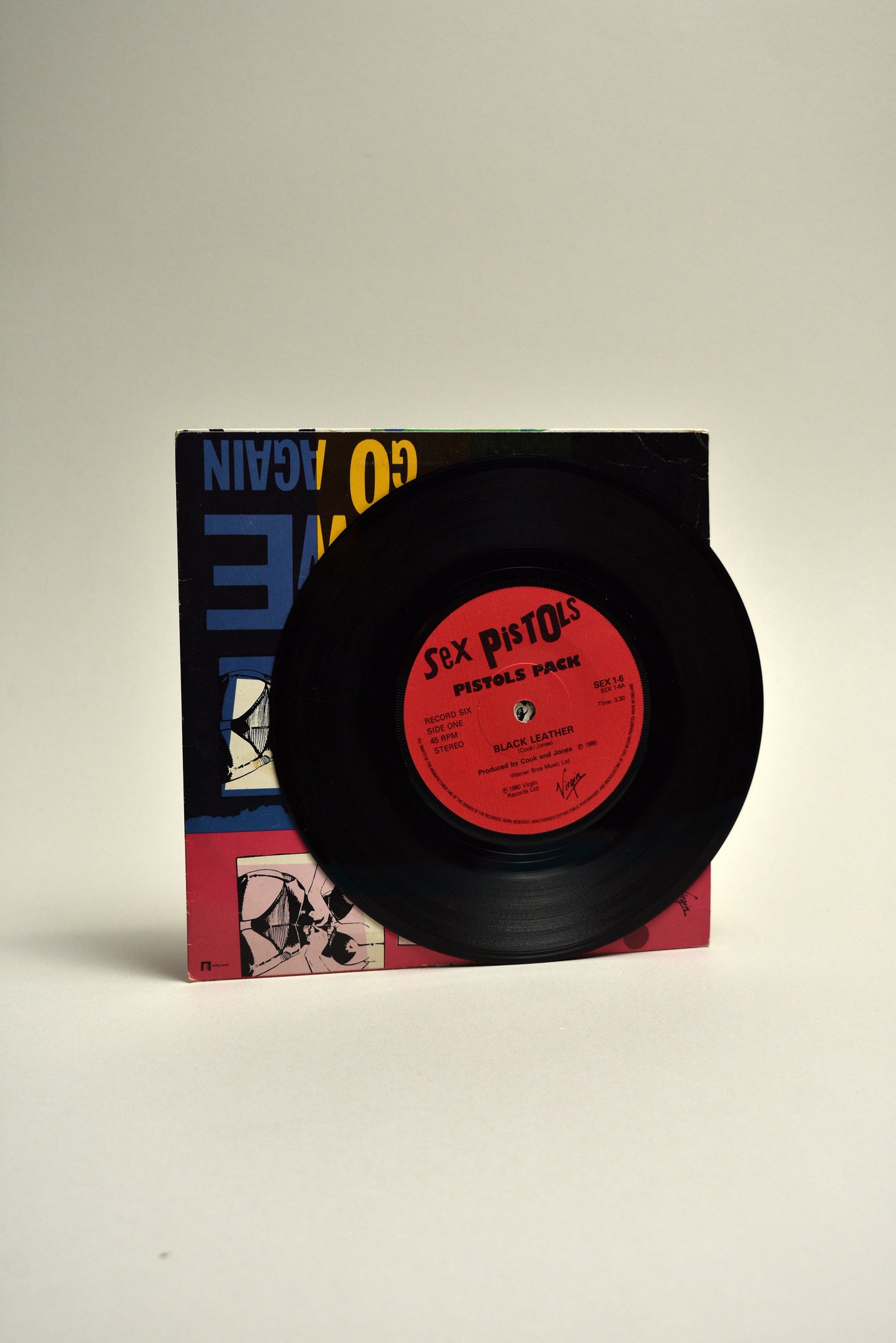 Sex Pistols – Black Leather / Here We Go Again [UK 7” Vinyl, 1980]