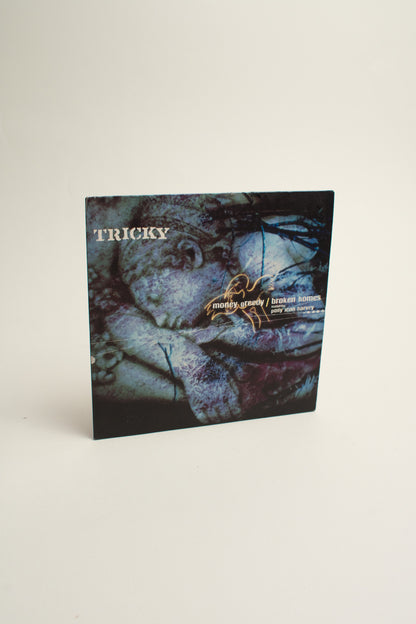 Tricky Featuring Polly Jean Harvey – Money Greedy / Broken Homes (UK, 7", 1998)