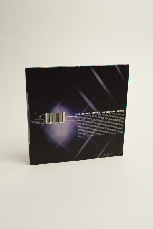Tricky Featuring Polly Jean Harvey – Money Greedy / Broken Homes (UK, 7", 1998)